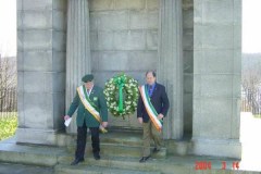 Bob Strutton and Jim Fitzgerald present wreath at the Dooley mausoleum