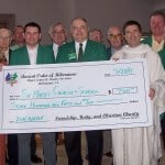 Winner Betty, Jim Cremins, Charles Johnston, Tim McDonnell, Brian Kiernan, Dan Caffrey, Paul McFadden, Jack Cassells, Fr. Michael Renninger, Jim Whelen, Jack Griffin